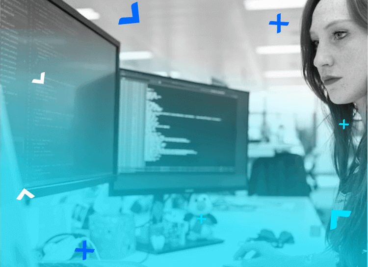Engineer woman working at her desk writing code